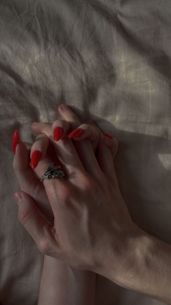 Two hands held together in low morning light